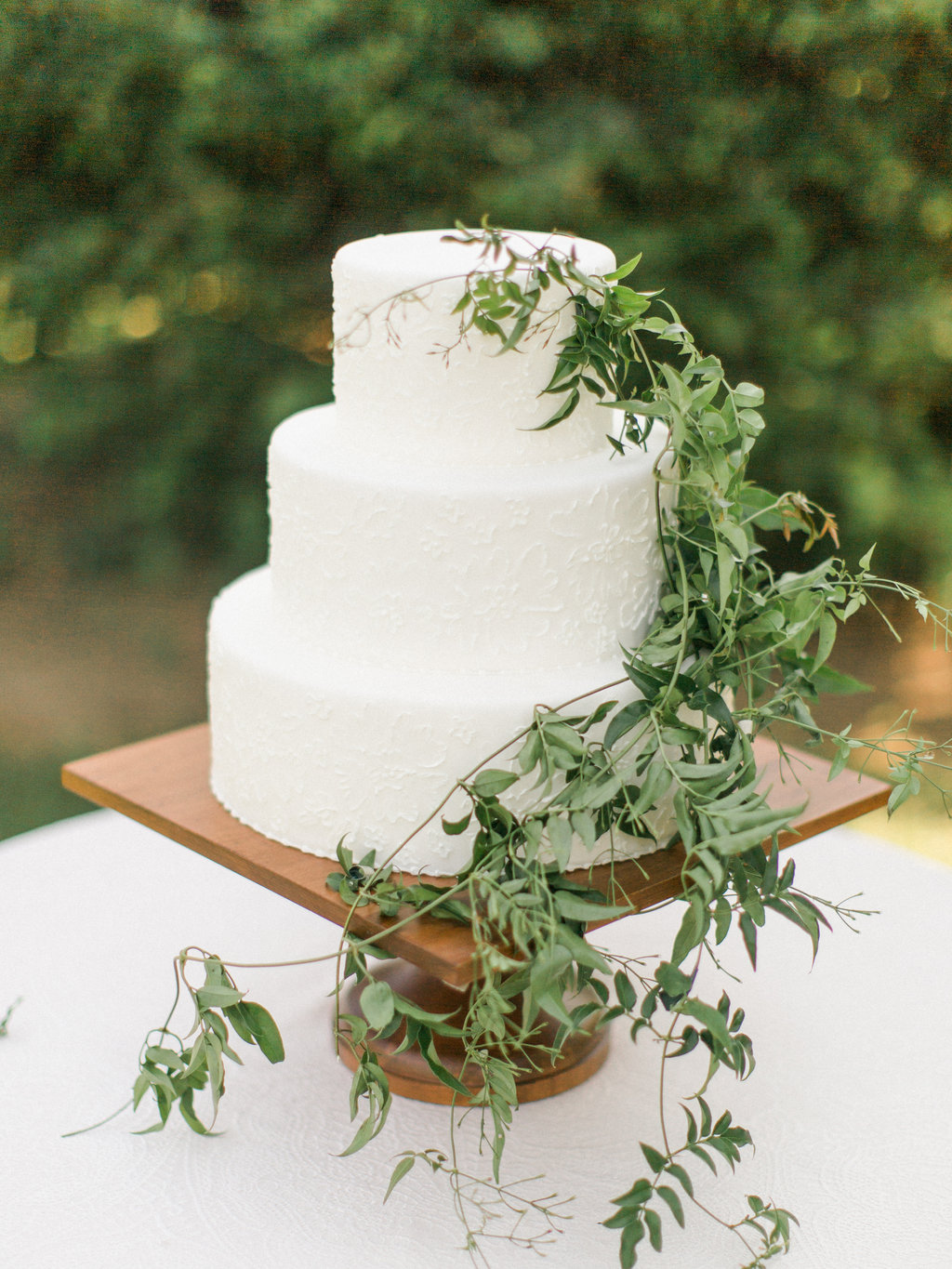 wedding cake with greenery