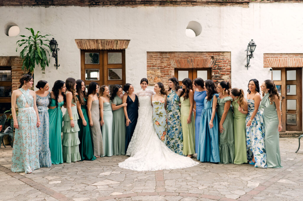 Bridesmaids in mix match blue and green dresses