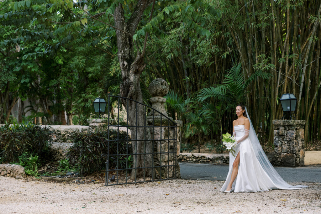 bride walking down garden aisle wedding